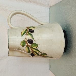 Hand made and hand painted Italian pottery pitcher.